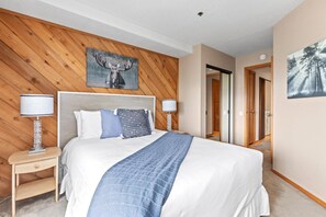 Bedroom features a Queen bed, dresser, and easy access to the shared bath. - KBM Resorts | Ridgepoint | Ski-in/Ski-out access, Common Hot Tub, Summer pool, Tennis, Parking, in Silver Lake Deer Valley! RGT-117 (Park City)