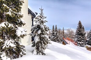 Snow-covered grounds create a true winter wonderland setting. - KBM Resorts | Ridgepoint | Ski-in/Ski-out access, Common Hot Tub, Summer pool, Tennis, Parking, in Silver Lake Deer Valley! RGT-117 (Park City)