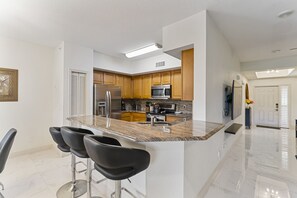 Fridge, microwave, oven, stovetop - Gorgeous 1st Floor Condo in Pelican Marsh (Naples)