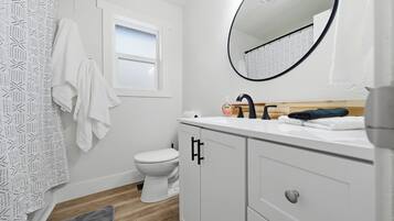 Hair dryer, towels, soap, toilet paper