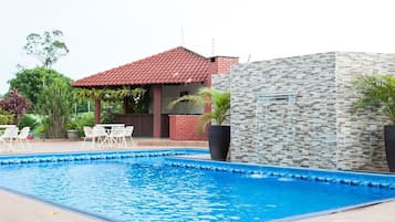 Outdoor pool, open 9:00 AM to 10:00 PM, pool umbrellas, sun loungers