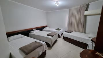 Standard Quadruple Room | 1 bedroom, desk, laptop workspace, blackout drapes