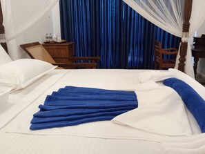 Family Triple Room | Minibar, individually decorated, desk, laptop workspace