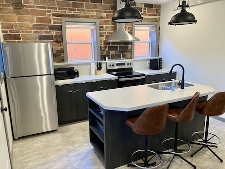 Fridge, microwave, oven, stovetop. Downtown 2BR Apartment