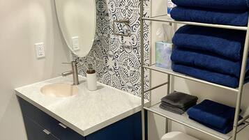 Hair dryer, towels, soap, shampoo