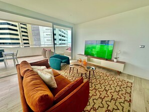 Comfort Apartment | Living area | 60-inch LED TV with digital channels, Netflix, Hulu - Santa Ana Guayaquil Lux Coliving Ecuador (Guayaquil)