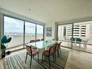 Comfort Apartment | Living area | 60-inch LED TV with digital channels, Netflix, Hulu - Santa Ana Guayaquil Lux Coliving Ecuador (Guayaquil)