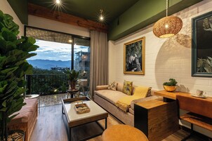 Premium Suite | Living area | 40-inch Smart TV with digital channels