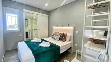 1 dormitorio, tabla de planchar con plancha, wifi gratis y ropa de cama