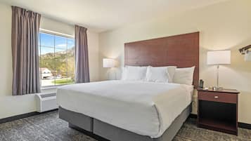 Premium bedding, down comforters, desk, laptop workspace