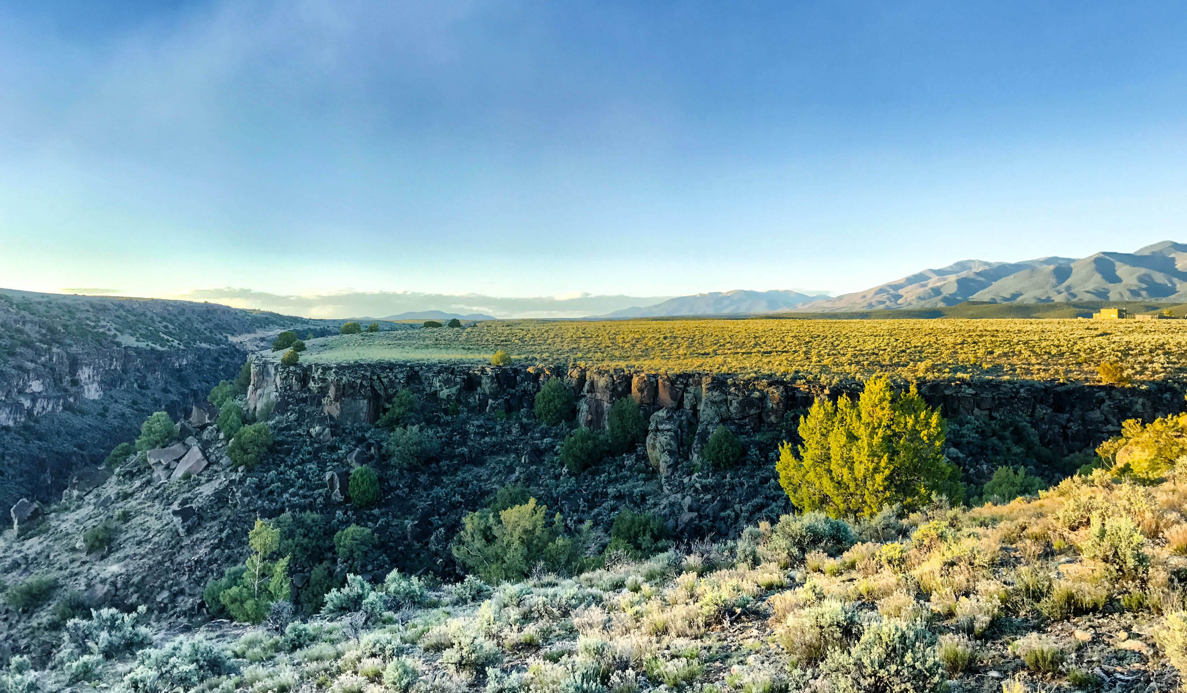 Bordering the Rio Grande Del Norte National Monument is a home on the Mesa
