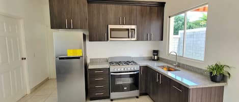 Microwave, oven, stovetop, coffee/tea maker