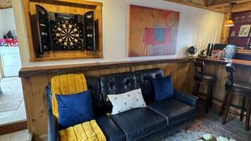 Smart TV, fireplace, books, stereo