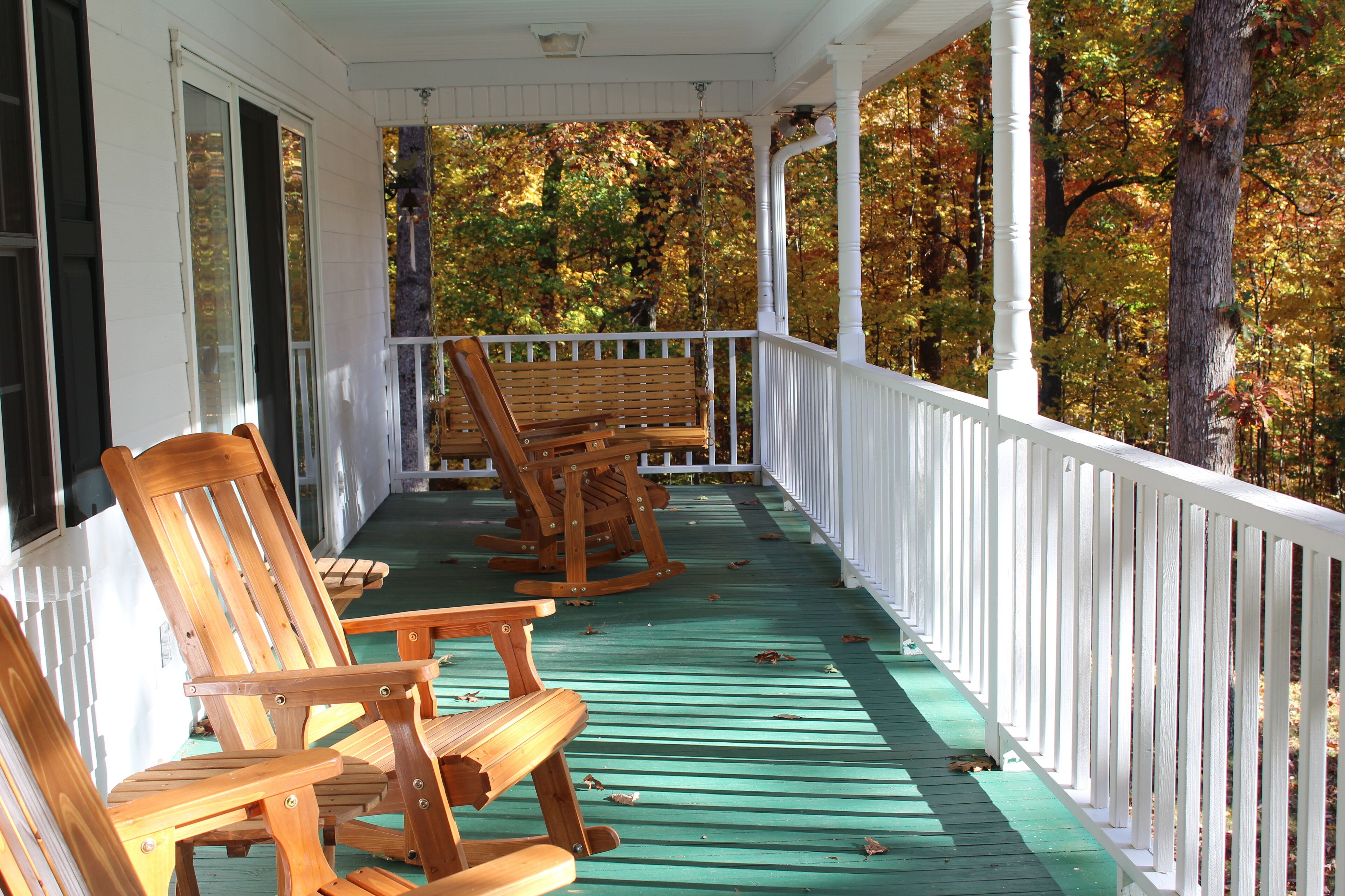 Rocking chairs and a swing on the covered porch