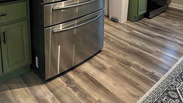 A kitchen with a stainless steel refrigerator, a microwave, and a stove. - Fantastic Master’s Rental- 1 mile away! (Augusta)