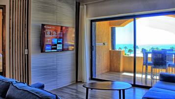 Smart TV, mesa de ping pong, libros