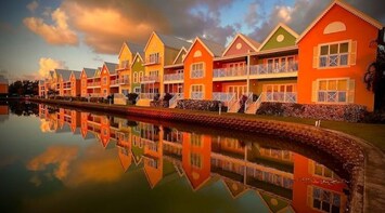 Sunrise view of The Sanctuary from the picturesque lagoon outback.