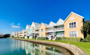 Exterior - Waterfront Sanctuary Serene, Grand Harbour, 2 Bed, 2 Bath, Pool, Patio (Grand Harbour)