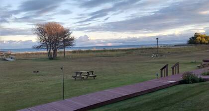 Oscoda Condo on the shore of Lake Huron. Ausable Township 800 feet of Beach.