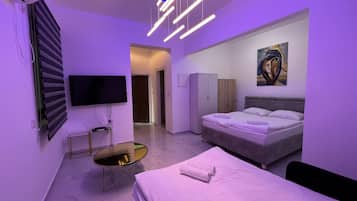 Basic Studio Suite | Individually decorated, individually furnished, laptop workspace