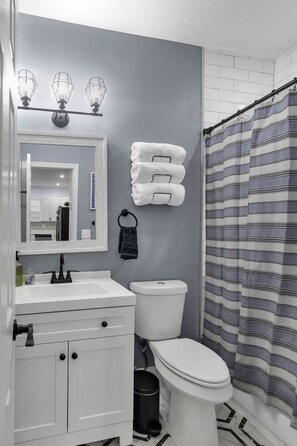 Hair dryer, towels, soap, shampoo
