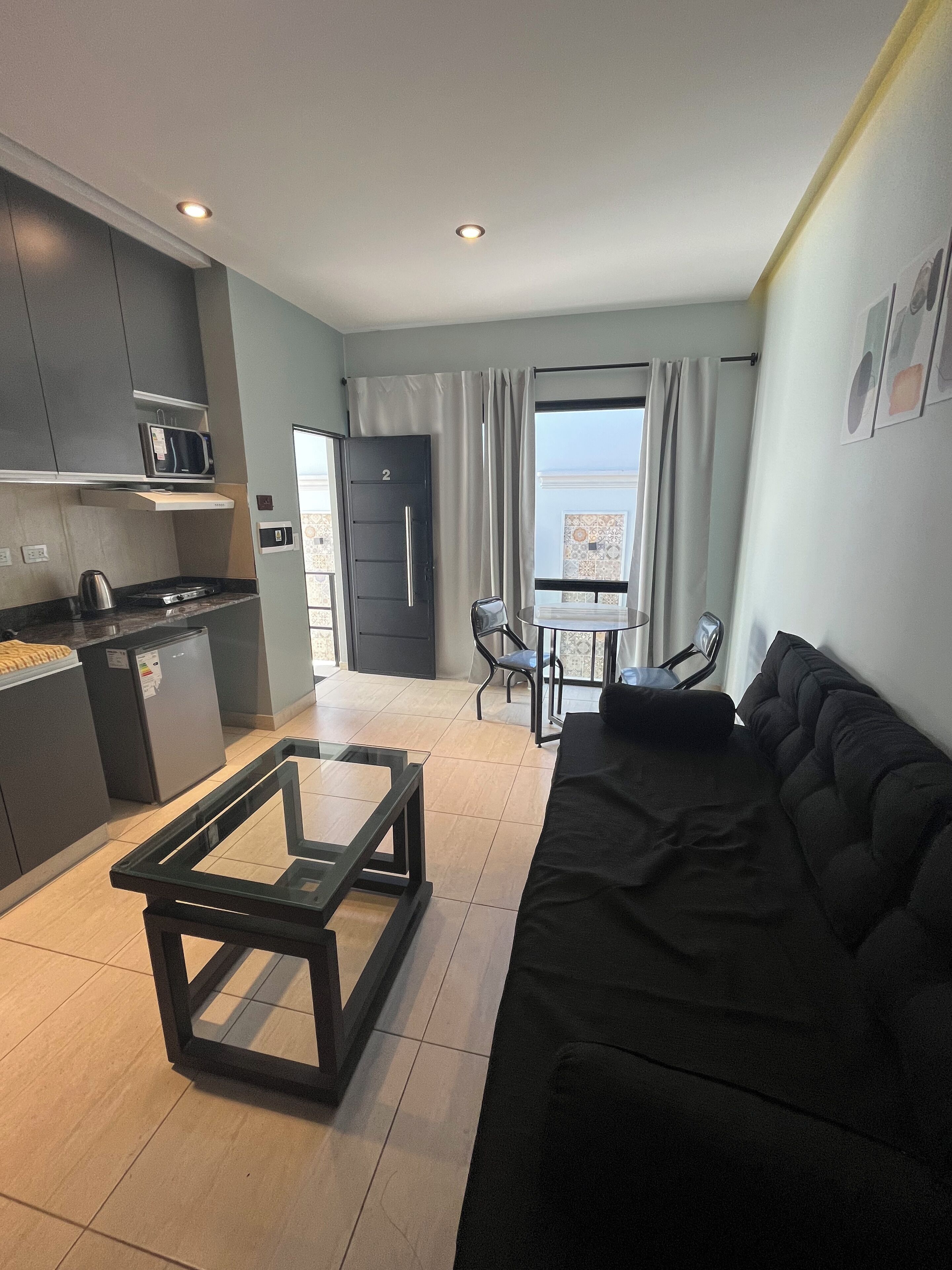 Exclusive Apartment | Living area | Flat-screen TV