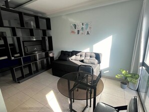 Deluxe Apartment | Living area | Flat-screen TV - Departamentos Muskuy (Salta)