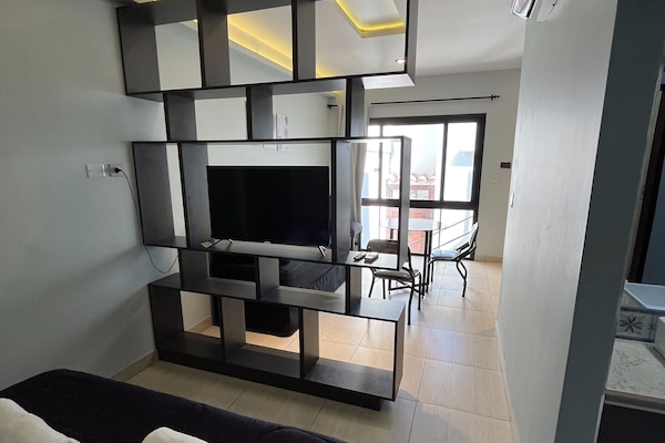 Apartemen Deluks | Area keluarga | TV layar datar