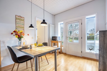 Dining. Apartment 'Alter Laden' with Private Terrace, Shared Garden and Wi-Fi