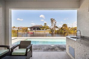 Outdoor pool, a heated pool - Dream Family Home Vacation (Cape Coral)