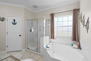 Shower, hair dryer, towels, shampoo