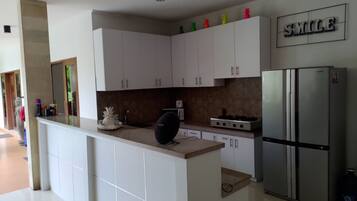 Fridge, microwave, stovetop, coffee/tea maker
