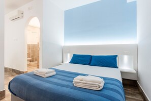 1 dormitori, planxa i posts de planxar, wifi gratuïta i roba de llit