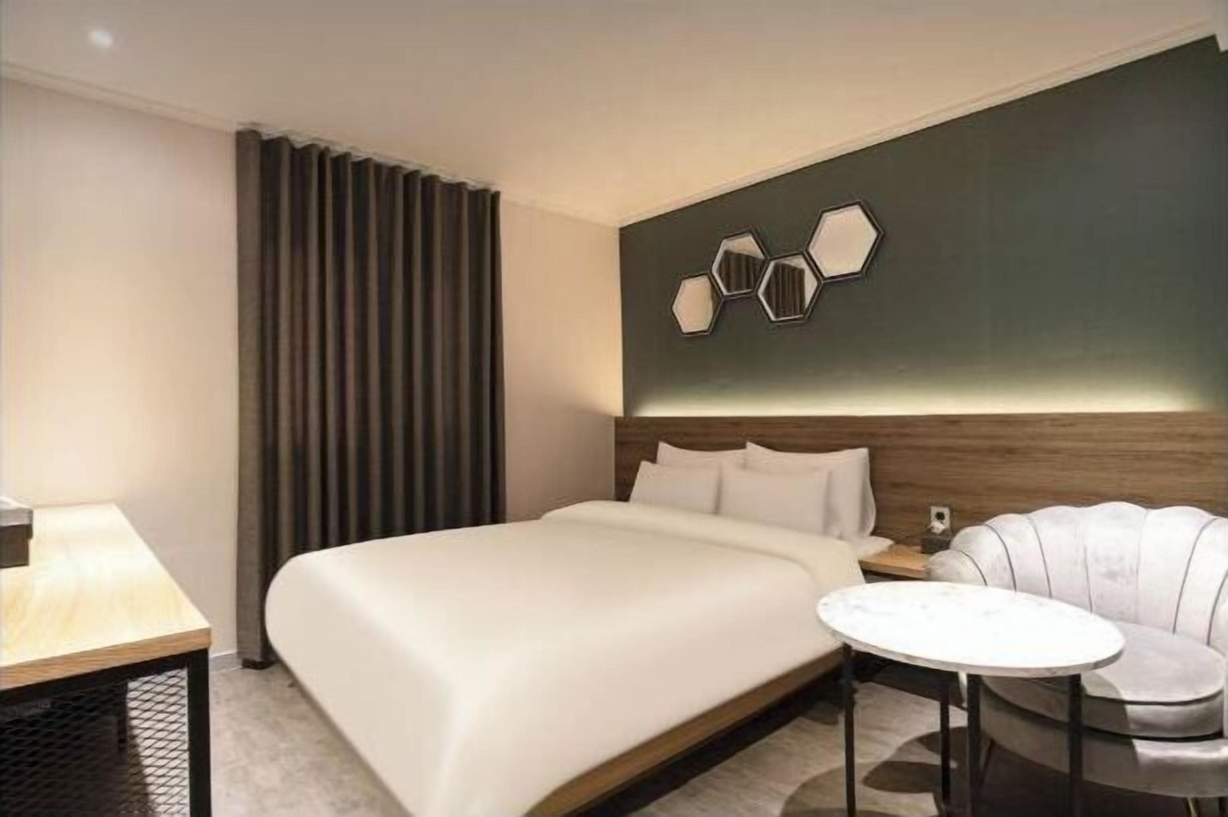 Geluiddichte muren, gratis wifi, beddengoed