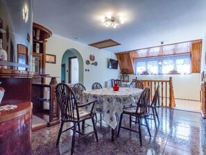 Enjoy meals in this inviting dining area with a round table and six comfortable chairs.