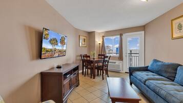 Signature Condo, 1 Bedroom, Balcony, Ocean View | Living room | 50-inch Smart TV with cable channels, video-game console, Netflix
