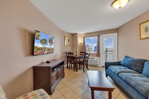 Signature Condo, 1 Bedroom, Balcony, Ocean View | Living room | 50-inch Smart TV with cable channels, video-game console, Netflix - Ocean View 1BR Condo (Myrtle Beach)