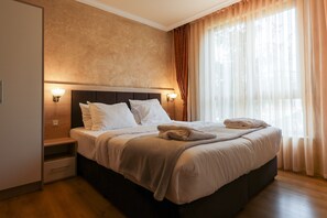 Safe på rommet, barnesenger (inkludert), wi-fi (inkludert) og sengetøy