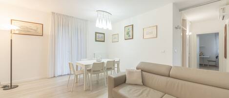 Comfort Apartment | Living area | Flat-screen TV