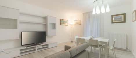 Comfort Apartment | Living area | Flat-screen TV