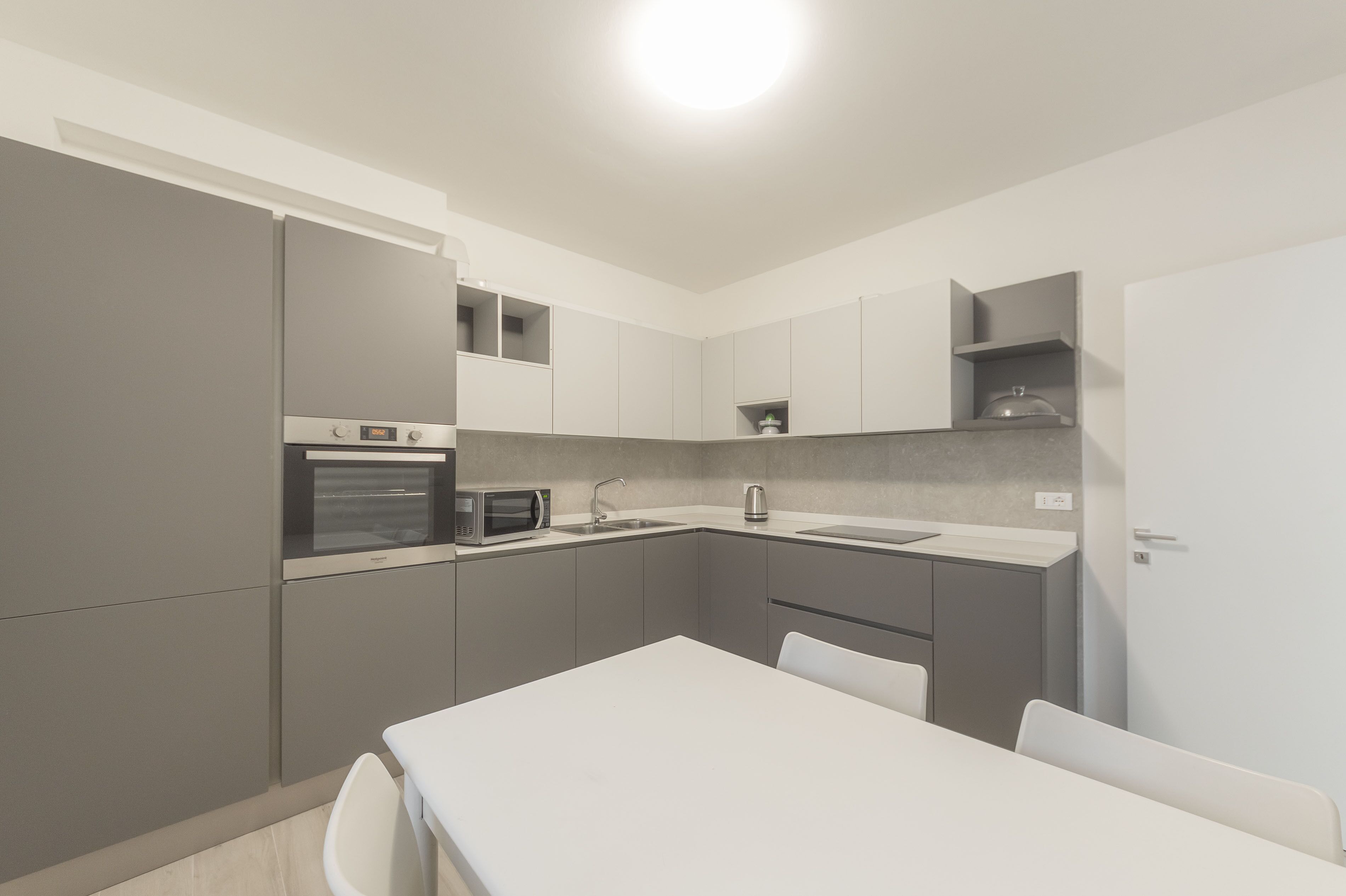 Comfort Apartment | Private kitchen | Full-sized fridge, microwave, oven, stovetop
