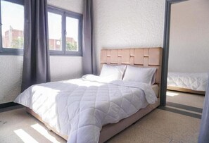 Habitación de lujo con 1 cama doble o 2 individuales | Wifi gratis y ropa de cama