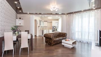 Apartment | Living area | 42-inch flat-screen TV with cable channels