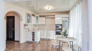 Apartment | Private kitchen | Full-sized fridge, microwave, oven, stovetop