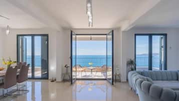 Panoramic Villa | Living room | 32-inch LCD TV with cable channels