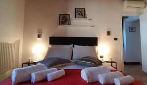 2 slaapkamers, een strijkplank/strijkijzer, gratis wifi, beddengoed