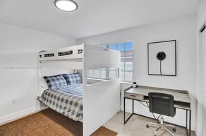 4 bedrooms, desk, iron/ironing board, travel crib