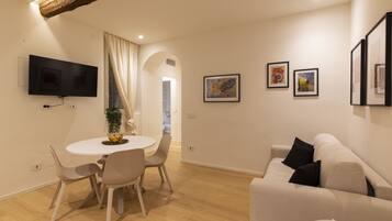 Comfort Apartment | Living area | 43-inch Smart TV with digital channels