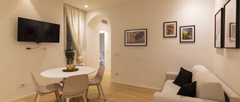 Comfort Apartment | Living area | 43-inch Smart TV with digital channels
