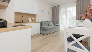 Living room - Cozy Apartment Lopuszanska by Renters (Warsaw)